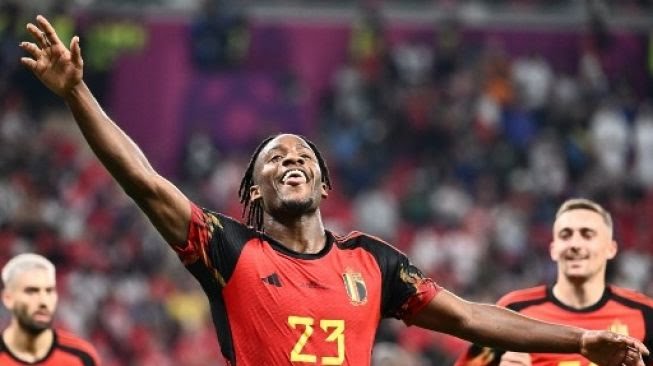 Penyerang Belgia #23 Michy Batshuayi merayakan golnya bersama rekan satu timnya selama pertandingan sepak bola Grup F Piala Dunia 2022 Qatar antara Belgia dan Kanada di Stadion Ahmad Bin Ali di Al-Rayyan, barat Doha.