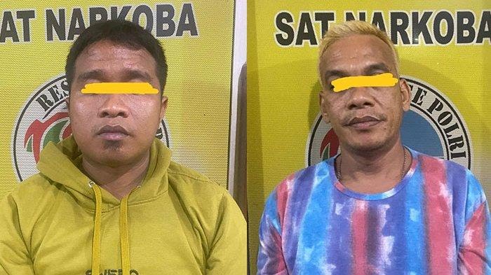 Kedua tersangka setelah diamankan di Mako Satres Narkoba Polres Binjai, Selasa (13/6/2023). (Dok/Polres Binjai)