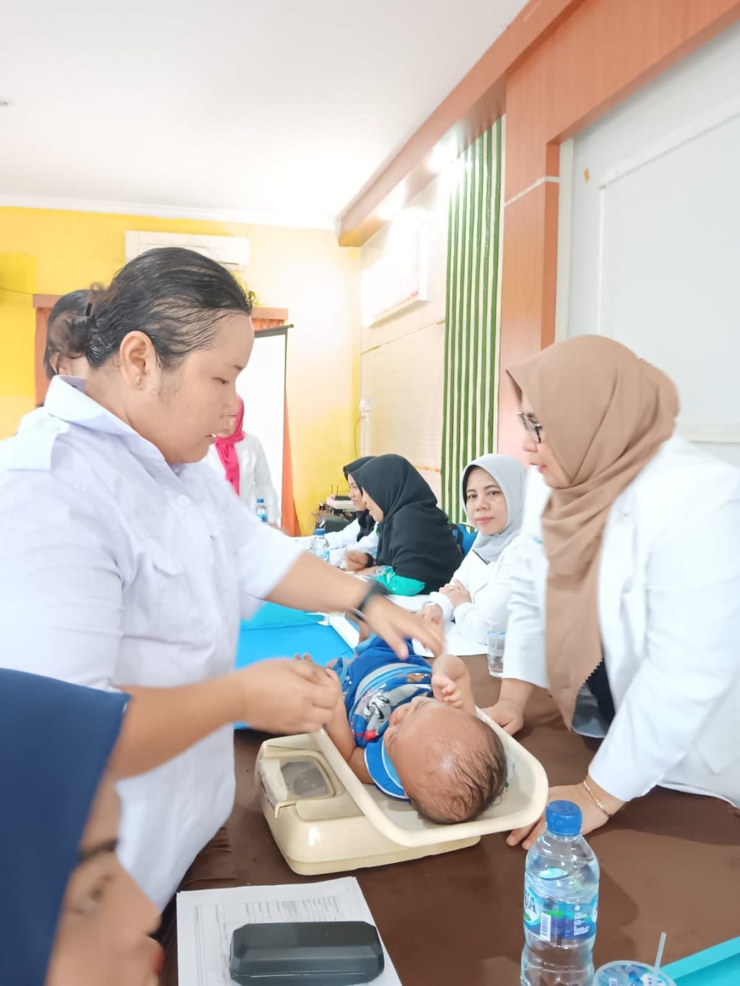 Tim Dinas P3APMPPKB Medan melaksanakan audit kasus stunting di Kecamatan Medan Belawan, Kamis (6/7/2023). (Dok/Kominfo Medan)