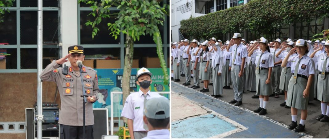 Kapolres Pematangsiantar AKBP Yogen Heroes Baruno SIK saat menjadi pembina upacara di SMA Swasta Sultan Agung di Jalan Surabaya, Senin (28/8/2023). (Dok/Humas Polres Pematangsiantar)