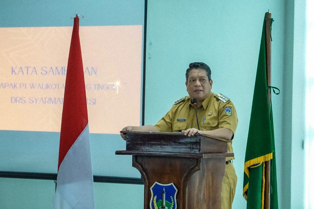 Pj Wali Kota Tebingtinggi Syarmadani membuka PKM I Penyusunan Draft Perda Penyelenggaraan Penanggulangan Bencana, di ruang Aula, Lantai IV, Gedung Balai Kota, Jalan Sutomo, Selasa (10/10/2023). (Dok/Kominfo Tebingtinggi)