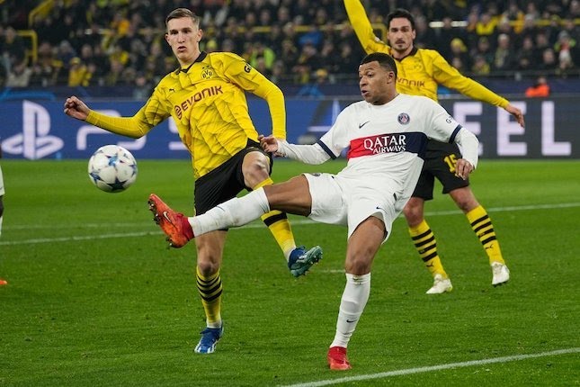 Aksi Kylian Mbappe dalam laga Borussia Dortmund vs PSG di Liga Champions 2023/2024, Kamis (14/12/2023) dini hari WIB.