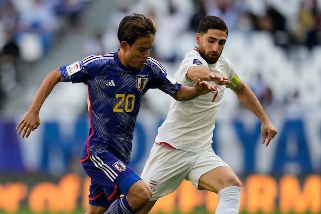 Duel Alireza Jahanbakhsh dan Takefusa Kubo dalam laga perempat final Piala Asia 2023 antara Iran vs Jepang, Sabtu (3/2/2024) malam WIB.