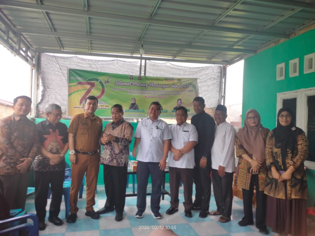 Alumni FH USU menggelar penyuluhan hukum kepada warga masyarakat di Desa Sambirejo Timur, Kecamatan Percut Seituan, Kabupaten Deliserdang, Senin (12/2/2024). (Dok/Humas Dies Natalis ke-70 FH USU)