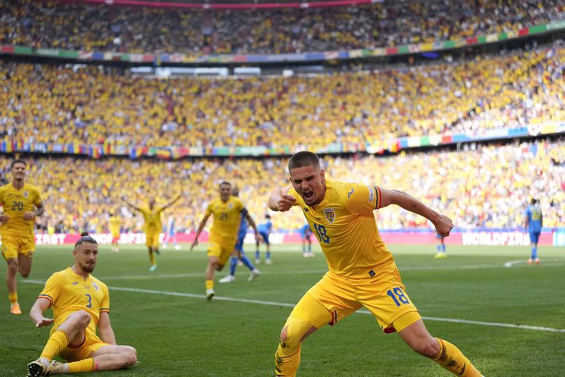 Razvan Marin merayakan golnya di laga Rumania melawan Ukraina di Euro 2024 di Allianz Arena, Senin (17/6/2024) malam WIB.