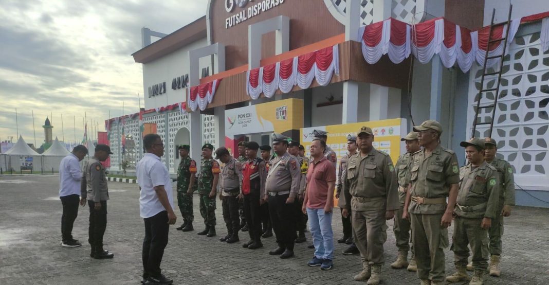 Personel Satgas Operasi Hatra Toba 2024 apel pengamanan pertandingan PON XXI di Gedung GOR Futsal Dispora, Jalan Wiliam Iskandar Pancing Medan, Senin (9/9/2024). (Dok/Polda Sumut)