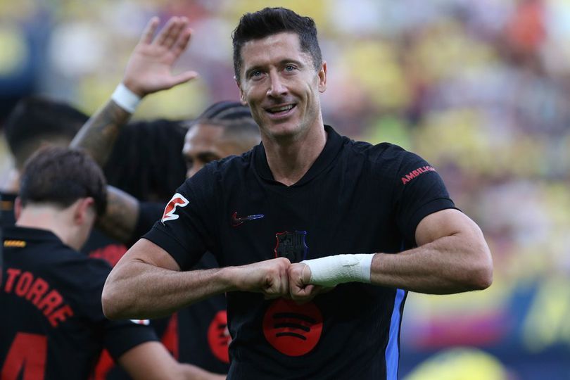 Selebrasi Robert Lewandowski dalam laga La Liga antara Villarreal vs Barcelona, Minggu (22/9/2024).