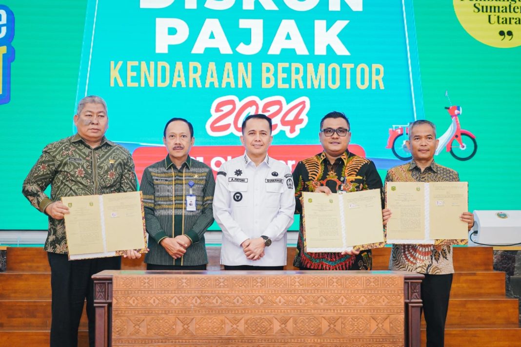 Pemko Medan bersama dengan Pemprov Sumut melakukan Penandatanganan Perjanjian Kerjasama Optimalisasi Pemungutan Pajak dan Sinergitas Pemungutan Opsen di Aula Raja Inal Siregar Kantor Gubernur Sumut, Jumat (25/10/2024). (Dok/Prokopim Pemko Medan)