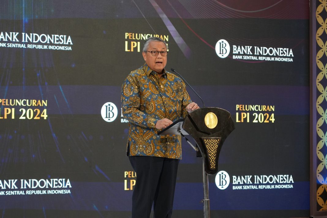 Gubernur Bank Indonesia, Perry Warjiyo, menyampaikan sambutan pada peluncuran Laporan Perekonomian Indonesia (LPI) 2024. (Dok/Bank Indonesia)