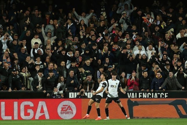 Selebrasi Hugo Duro dalam laga La Liga antara Valencia vs Real Madrid, Sabtu (4/1/2025).