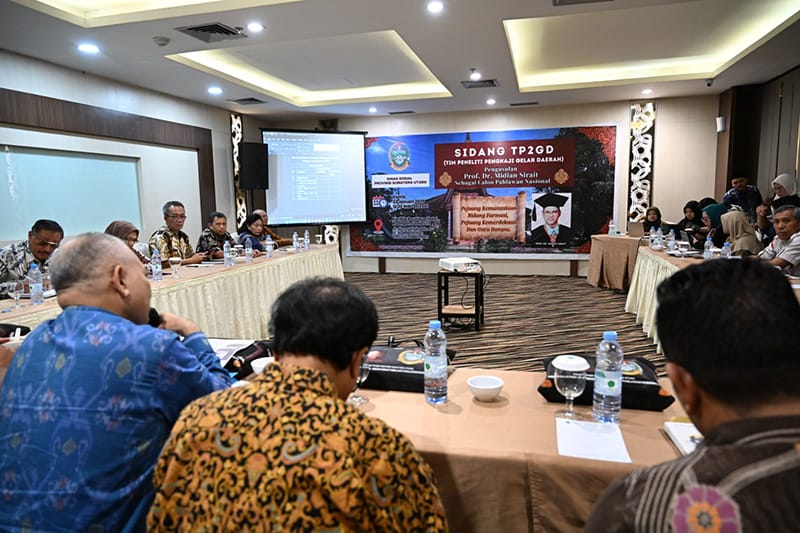 Sidang TP2GD pengusulan Prof Dr Midian Sirait sebagai calon pahlawan nasional di Hotel Karibia, Medan, Kamis (23/1/2025). (Dok/Diskominfo Sumut)