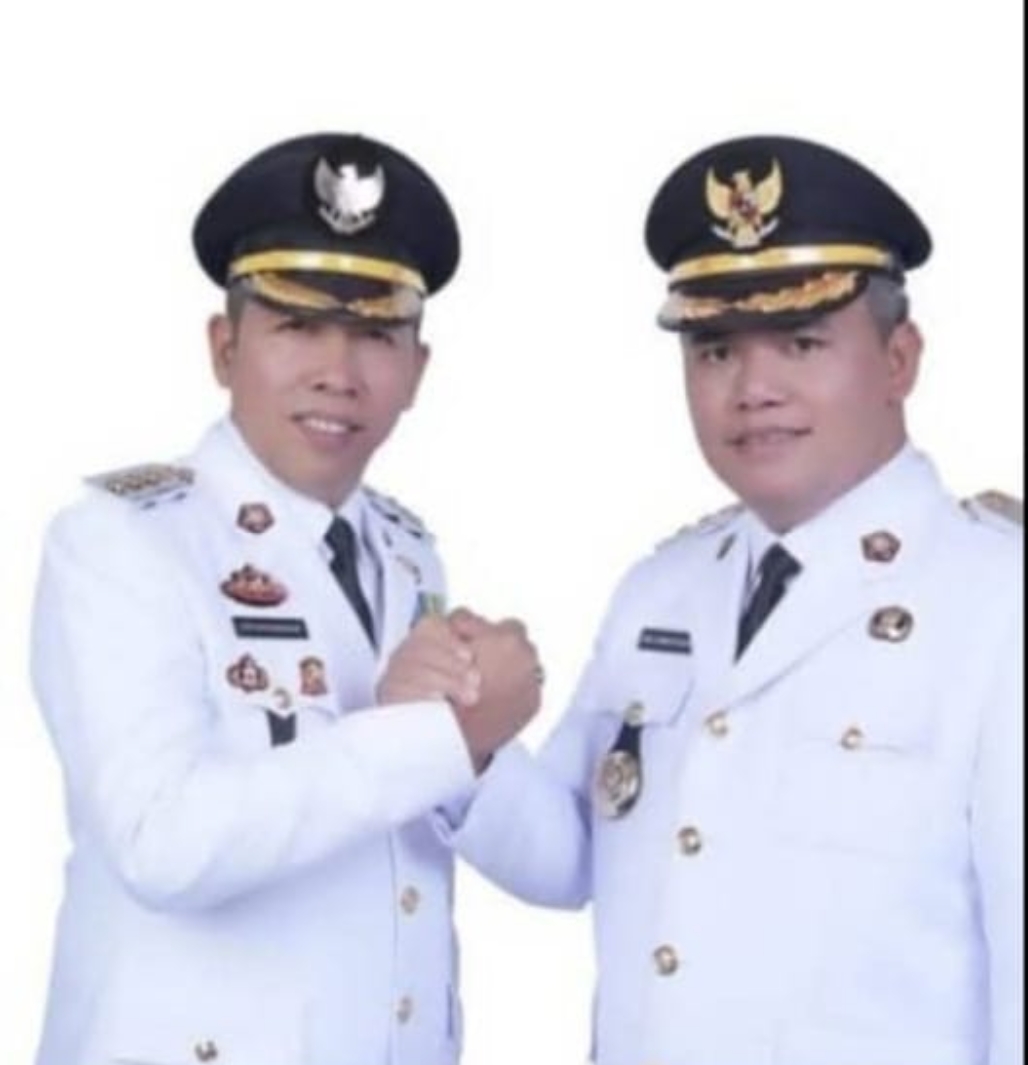 Bupati Dr JTP Hutabarat SSi MSi - Wakil Bupati Dr Deni Lumbantoruan MEng.