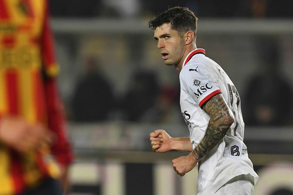 Serie A 2024/2025: Selebrasi Christian Pulisic usai cetak gol untuk AC Milan dalam laga di kandang Lecce pada pekan 28, Minggu (9/3/2025) dini hari WIB.