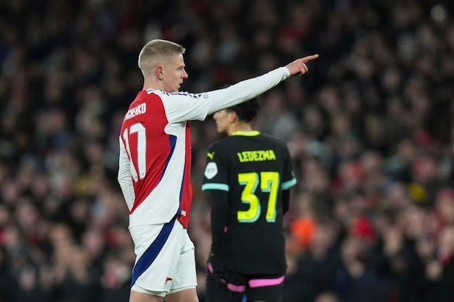 Selebrasi Oleksandr Zinchenko dalam laga Liga Champions antara Arsenal vs PSV Eindhoven, Kamis (13/3/2025).
