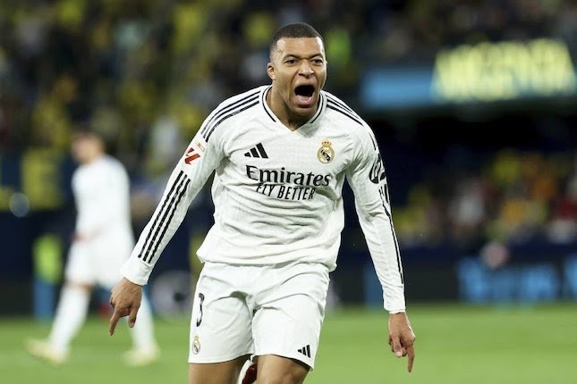 Kylian Mbappe merayakan gol kedua Real Madrid dalam laga Villarreal vs Real Madrid di La Liga, Minggu (16/3/2025) dini hari WIB.